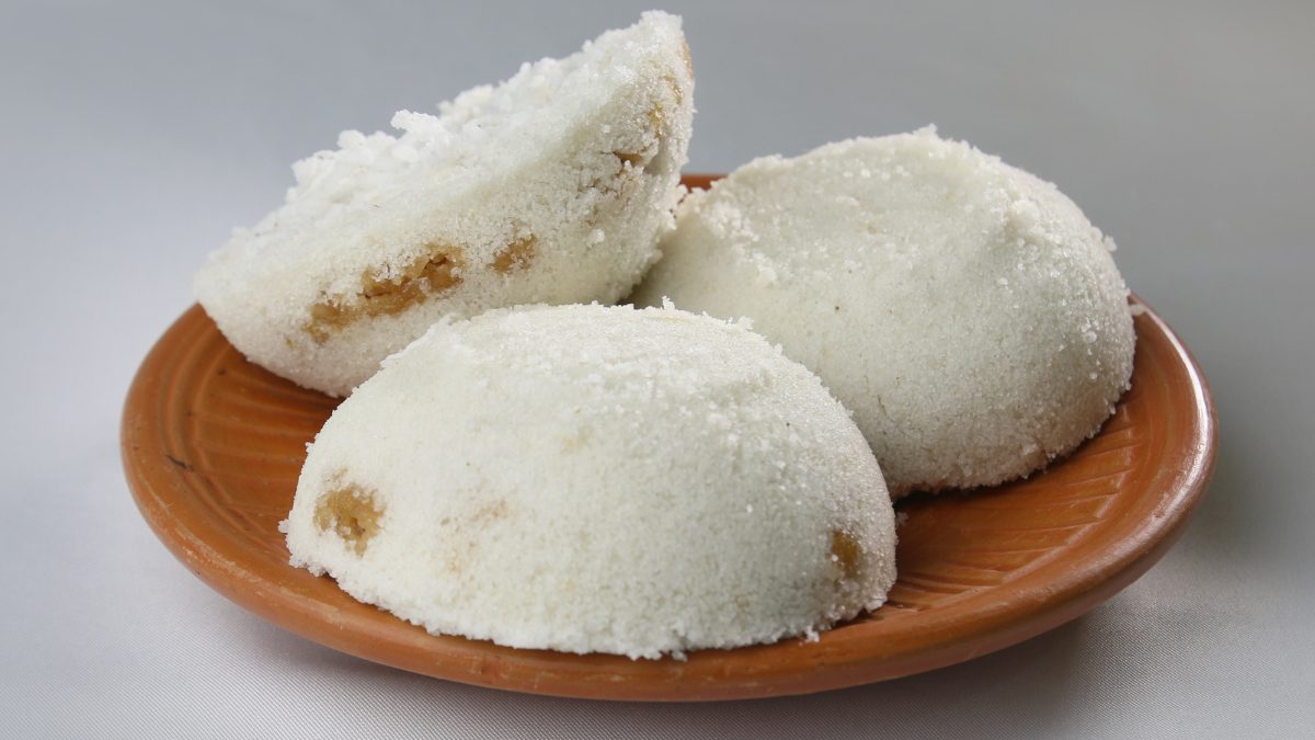Keteli Pitha Or Bhapa Pitha Or Tekeli Pitha (steamed Rice Cakes With Coconut And Jaggery) recipe
